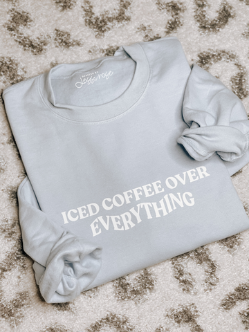 ICED COFFEE OVER EVERYTHING Light Blue Crewneck Sweatshirt
